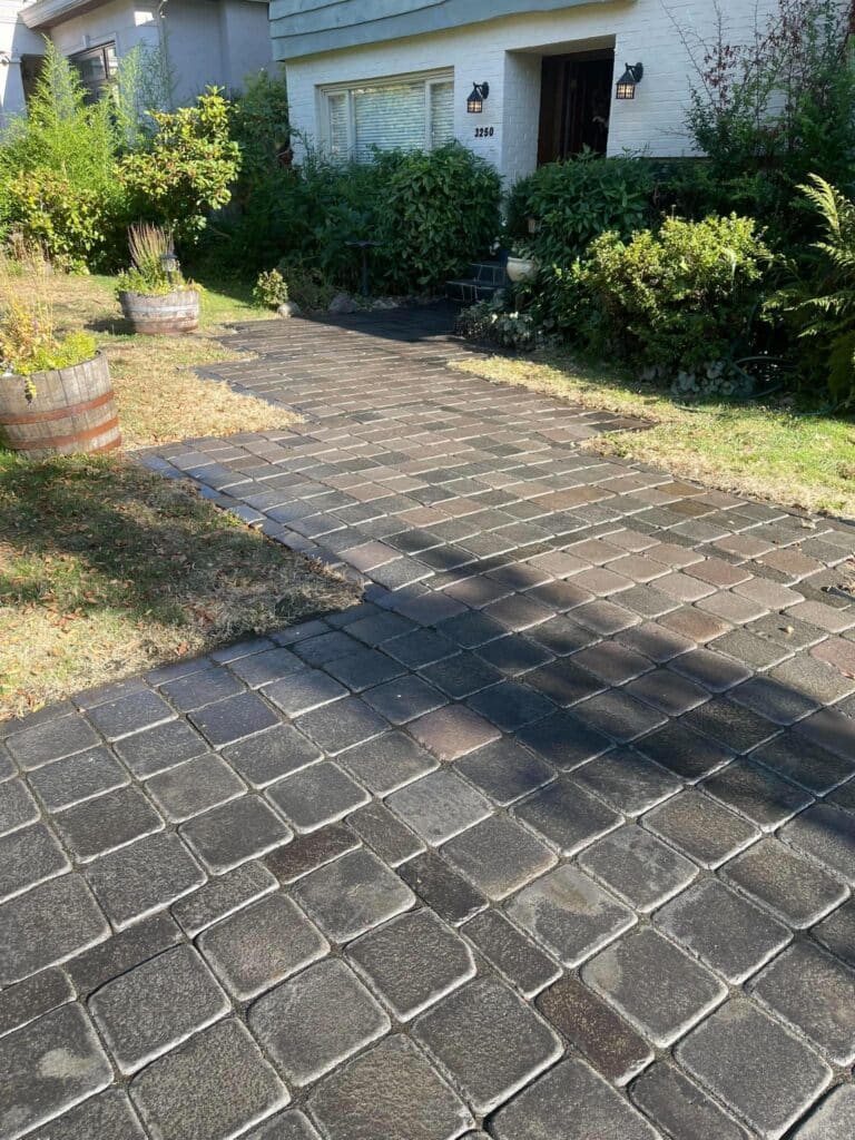 Interlocking paver driveway after professional cleaning and sealing in Surrey, BC