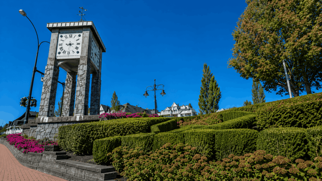 Charming town square with clock tower at Maillardville
